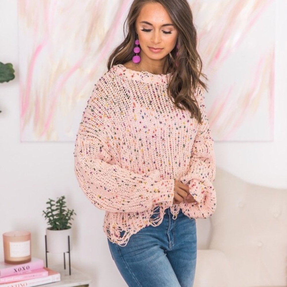 Pink confetti sweater with distressed detailing